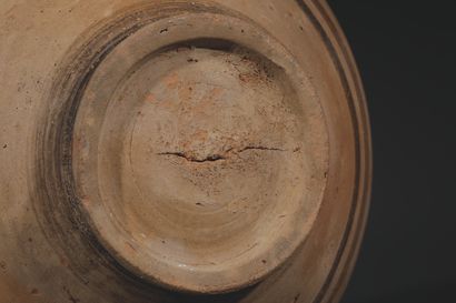 STEEL JAR
Adorned with a pair of concentric...