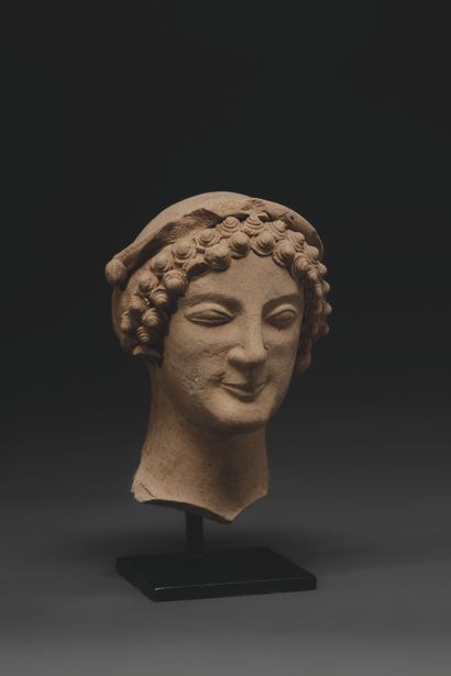 VOTIVE HEAD OF A YOUNG MAN
Sketching an archaic...