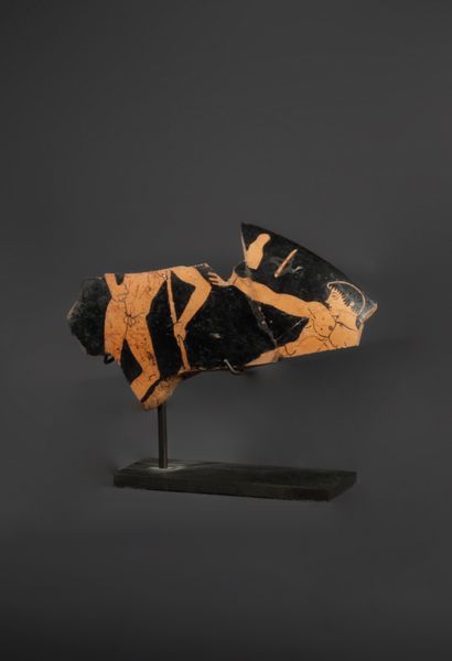 FRAGMENTARY RED-FIGURE KYLIX
The exterior...