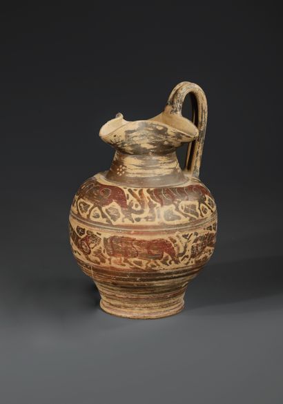 OENOCHOE WITH THREE-LOBED MOUTHPIECE
The...