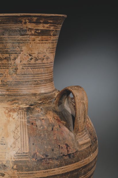 GEOMETRIC AMPHORA
Light brown, buff-colored...