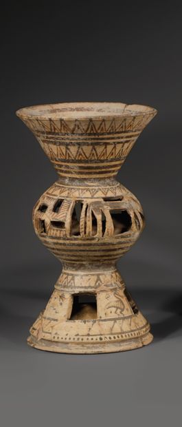 THYMIATERION
Spherical body between a conical...