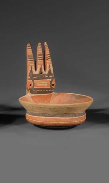 KYATHOS
The handle adorned with a three-pointed...