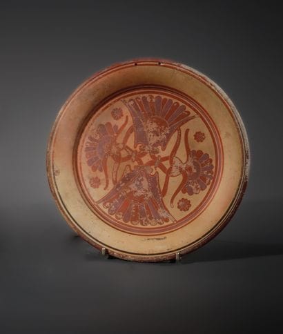 ASSET
Central medallion motif featuring four...