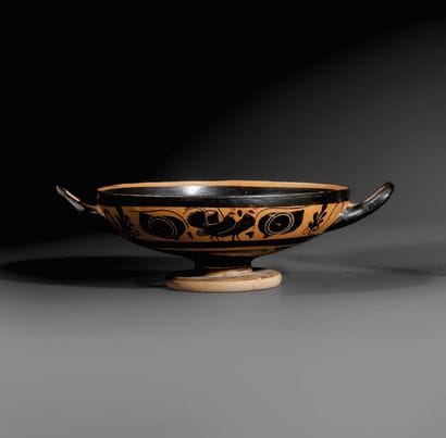 BLACK-FIGURE EYE BOWL
The sides are decorated...
