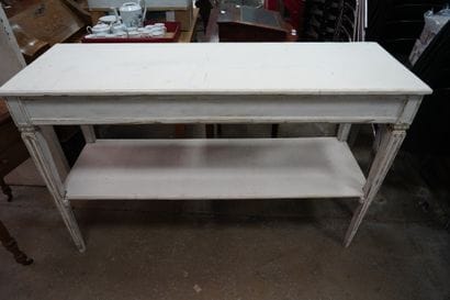 Table à jeux en bois vernis, les pieds gaines...