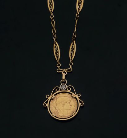 PENDANT
750 thousandths yellow gold and 850...