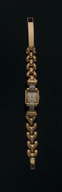 OMEGA
LADY'S WRISTWATCH
750 thousandths yellow...