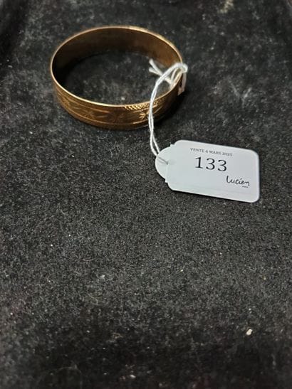 Bracelet rigide en or jaune 18k (750) à décor...