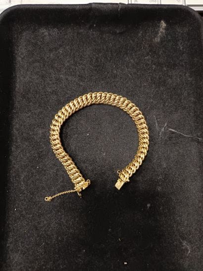Bracelet en or jaune 18k (750) à mailles...