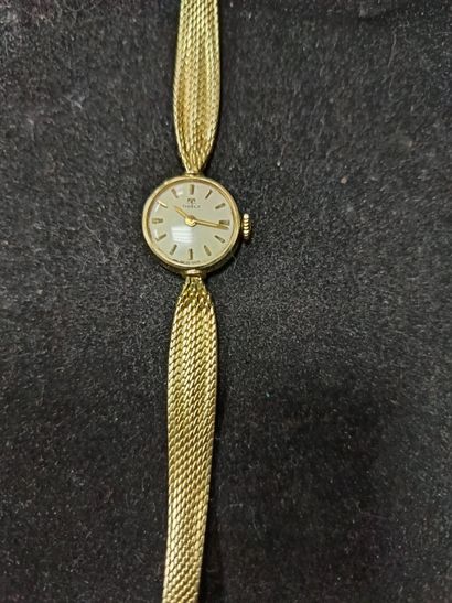 TISSOT
Montre bracelet de dame en or 14K...