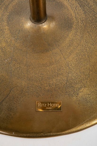 PAIR OF GUERIDONS, RITZ
Gilded metal, circular...