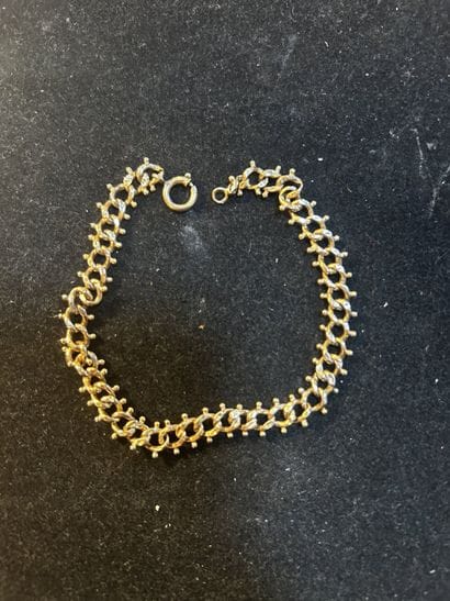 Bracelet en or jaune 18K, à mailles souples...