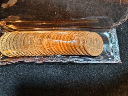 Réunion de 25 pièces de 20 francs or, sous...