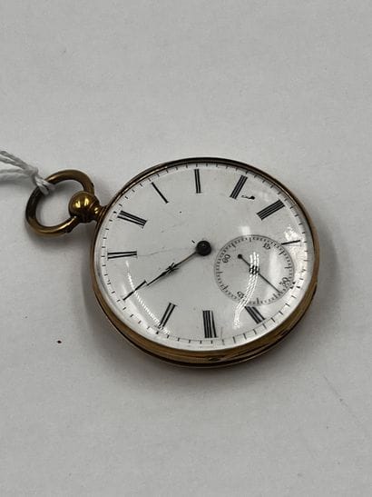 Montre de gousset en or jaune 18K, le dos...