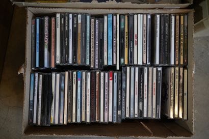 Réunion de volumes, BD, CD et jouets dont...
