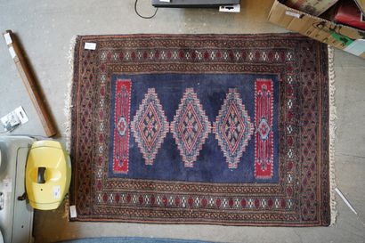 Petit tapis en laine brun
En l'état