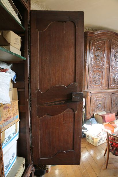 Armoire de mariage en chêne mouluré et sculpté,...