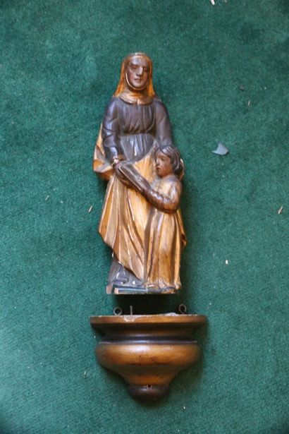 Sainte Anne et enfant en applique et sa console,...