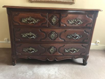 Commode en bois naturel teinté ouvrant par...
