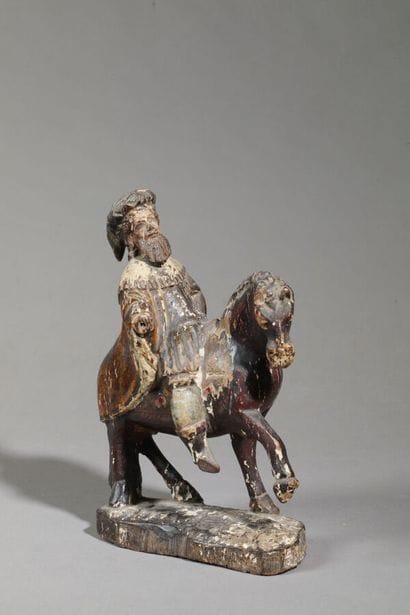 
Cavalier, en bois polychrome. 




École...