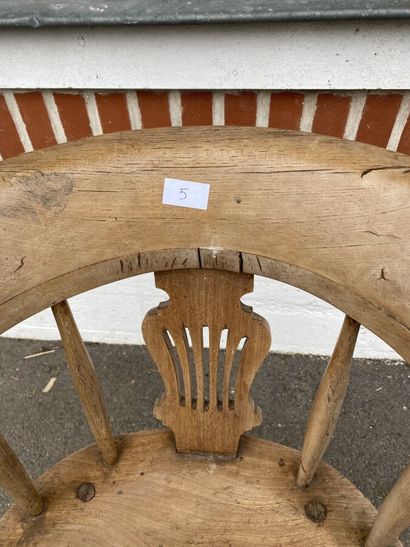 Armchair in natural wood, openwork back decorated...