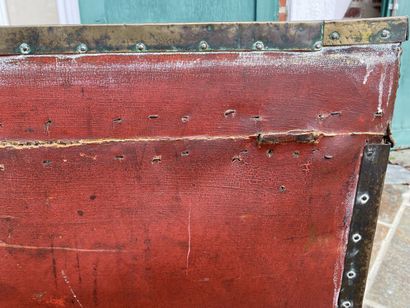 Wooden chest covered with studded burgundy...