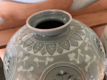 Set of 3 vases: two in celadon green porcelain...