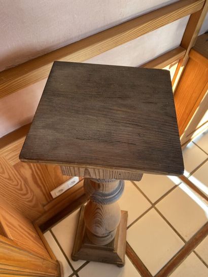 Sellette of baluster form in pitchpin. 
Height...