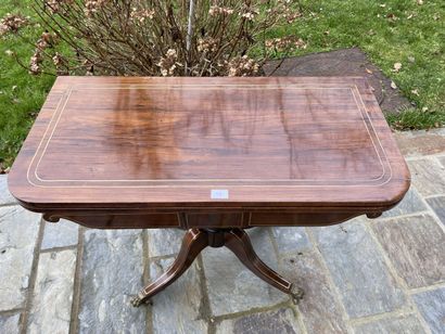 Mahogany and mahogany veneer game table,...