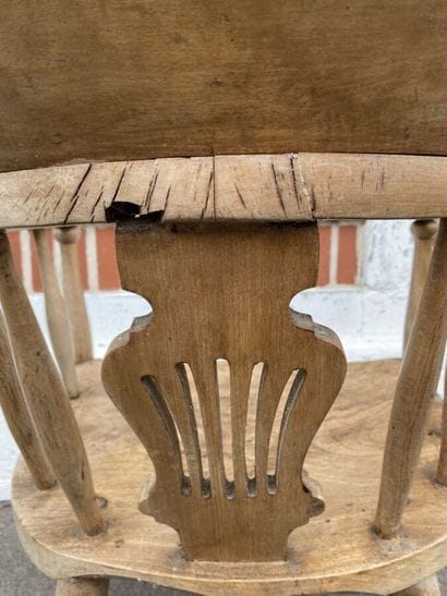 Armchair in natural wood, openwork back decorated...