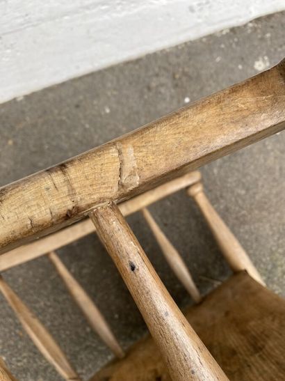 Armchair in natural wood, openwork back decorated...
