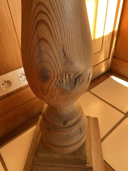 Sellette of baluster form in pitchpin. 
Height...