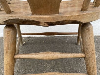 Armchair in natural wood, openwork back decorated...