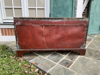 Wooden chest covered with studded burgundy...