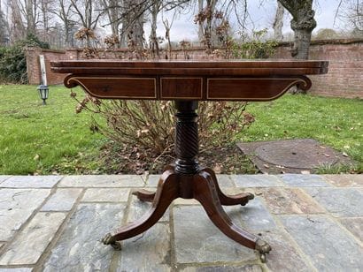 Mahogany and mahogany veneer game table,...