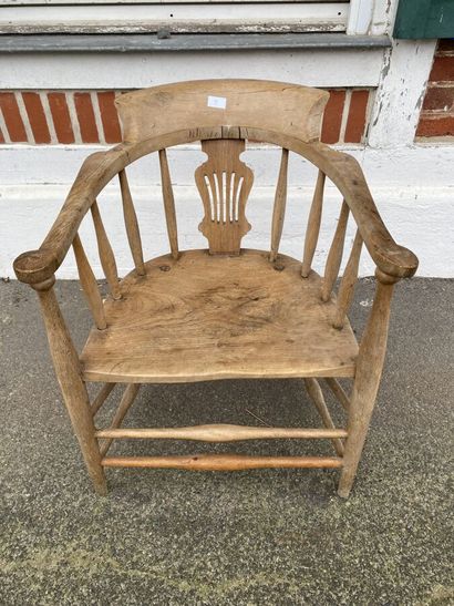 Armchair in natural wood, openwork back decorated...