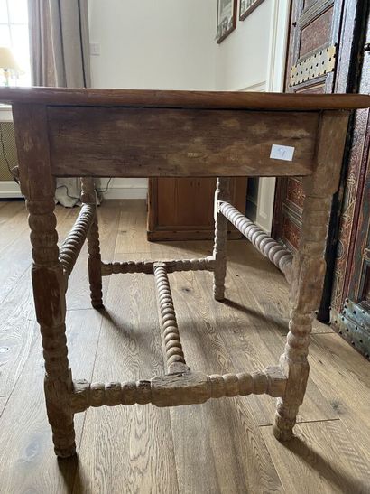 Table in natural wood, legs and struts with...