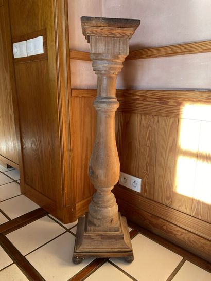 Sellette of baluster form in pitchpin. 
Height...