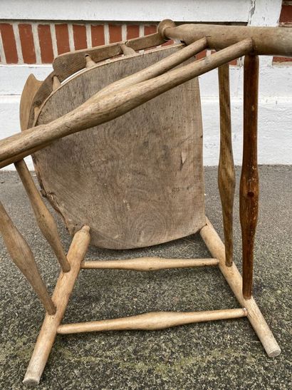 Armchair in natural wood, openwork back decorated...
