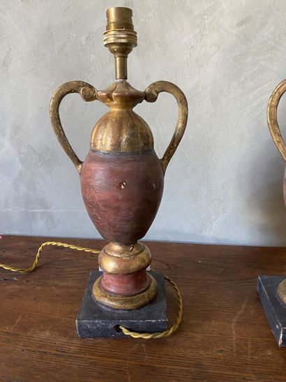 Pair of lacquered and gilded wood lamp bases...