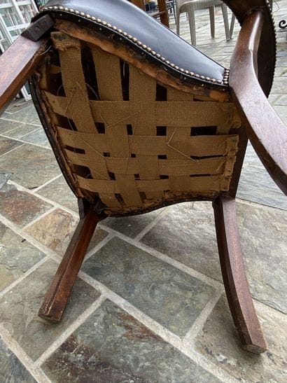 Office armchair in stained wood with brown...