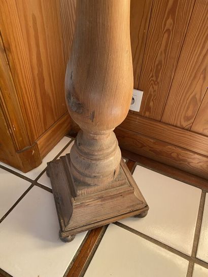 Sellette of baluster form in pitchpin. 
Height...