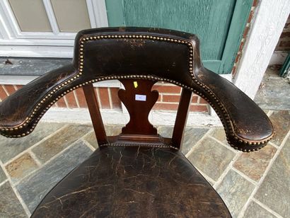 Office armchair in stained wood with brown...