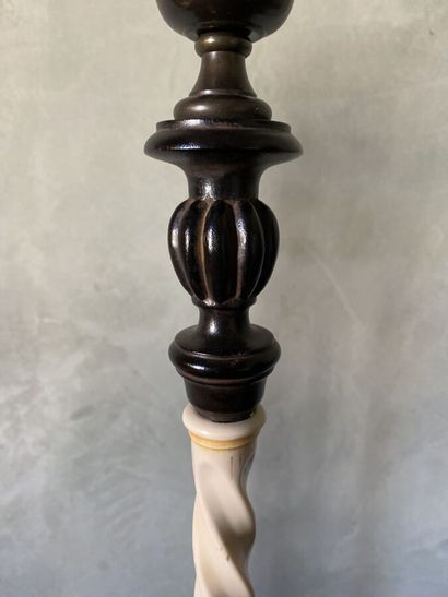 Pair of lamp feet in black lacquered composition...