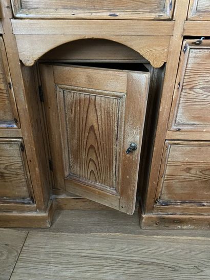 Pitchpin desk with seven drawers and a door...