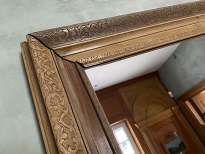 Mirror with natural wood frame, carved with...