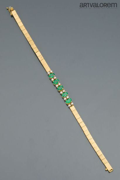 Line bracelet in yellow and white gold 750°/°°...