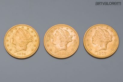 UNITED STATES
Three 20-dollar liberty gold...