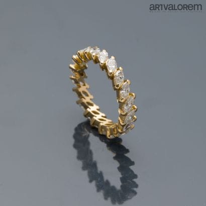 American wedding band in yellow gold 750°/°°...